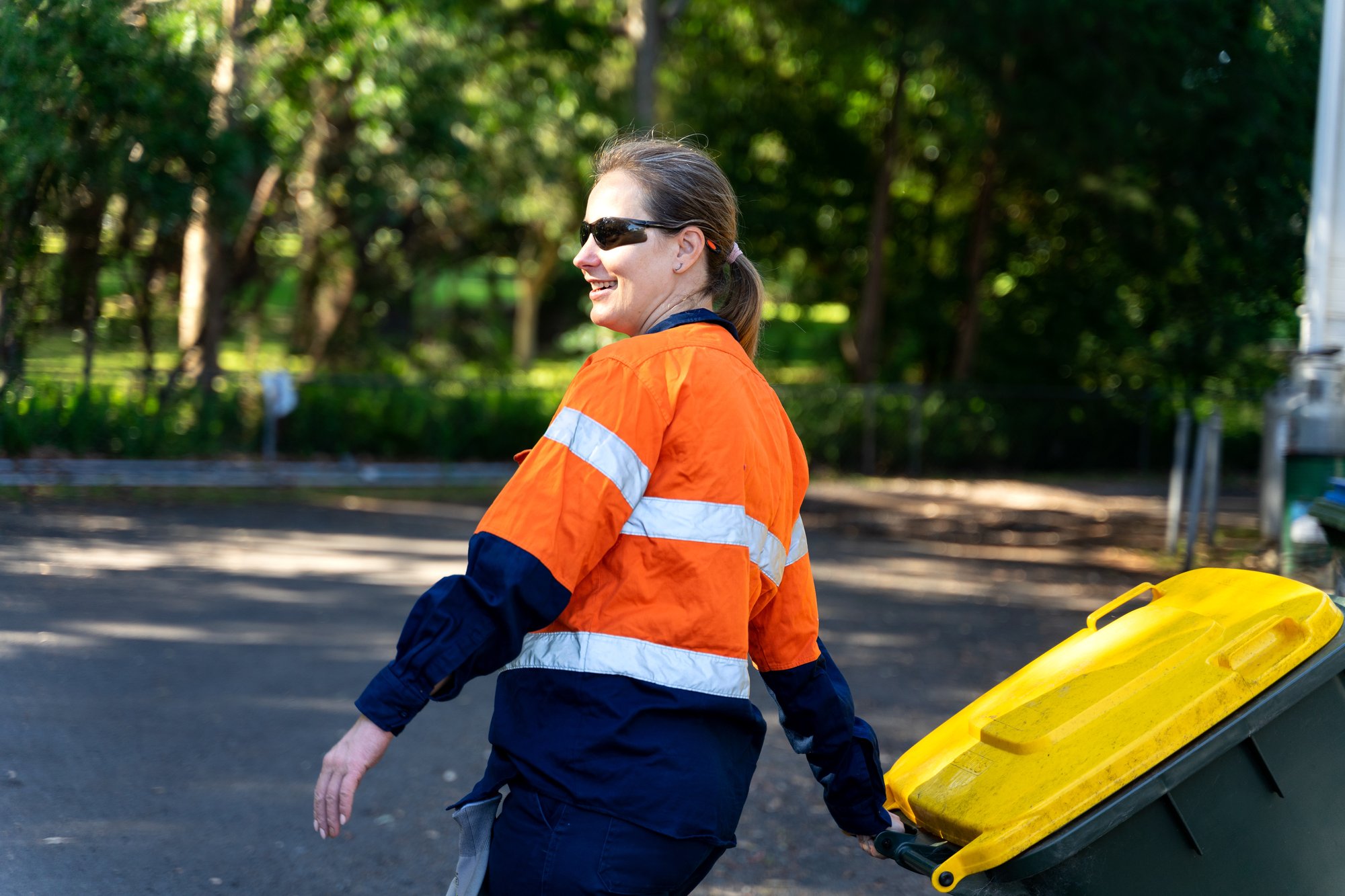 Council worker doing waste